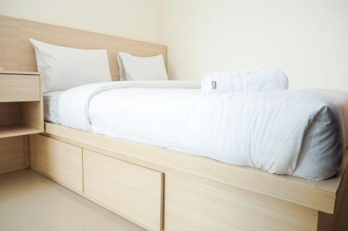 Comfort and Cozy 2BR Apartment Parahyangan Residence By Travelio in Bandung