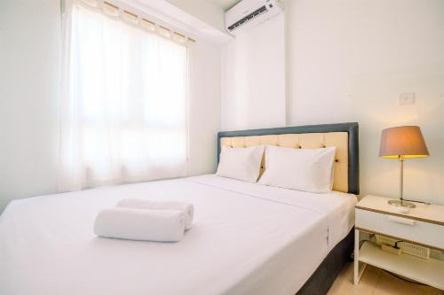 Comfort and Homey 2BR at Titanium Square Apartment By Travelio