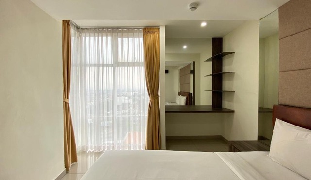 Comfy 3BR at Grand Asia Afrika Bandung Apartment By Travelio