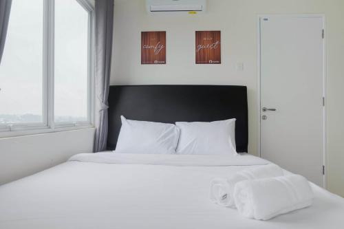 Cozy 2BR Bogorienze Apartment near Nirwana Residence By Travelio
