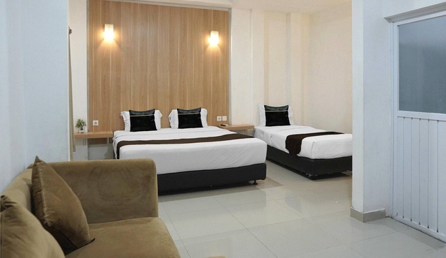 Family Friendly Suite W/Free WiFi Parking and Pool in Padang