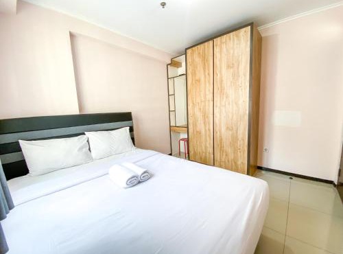 Minimalist 2BR with Pool View at Gateway Pasteur Apartment By Travelio in Bandung