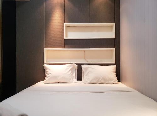Nice and Cozy Living 2BR Apartment at Green Bay Pluit By Travelio