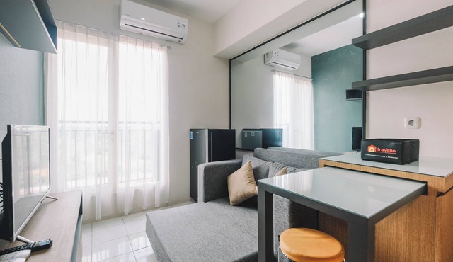 Simple and Cozy Living 2BR at Podomoro Golf View Apartment