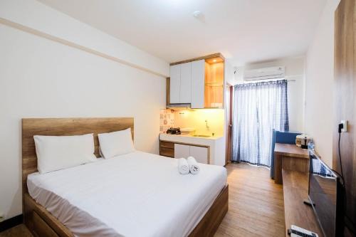 Simple and Homey Studio Room at Cinere Resort Apartment By Travelio