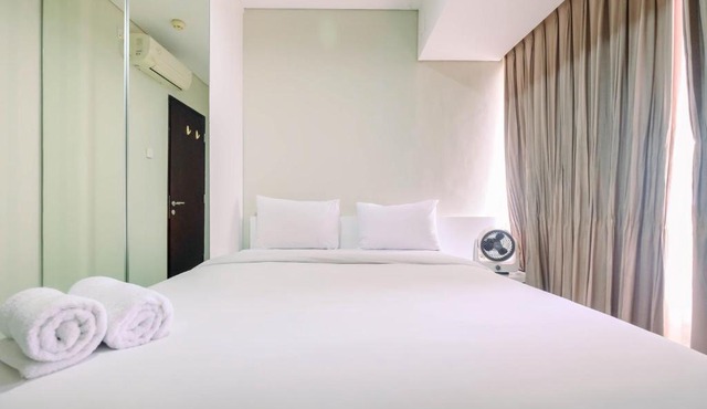 Spacious and Comfy 2BR Nifarro Park Apartment By Travelio