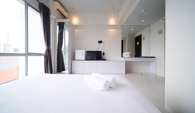 Strategic And Comfy Studio (No Kitchen) At Grand Darmo Suite Apartment