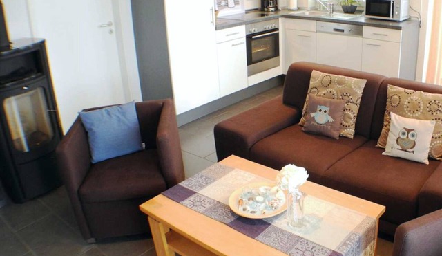 Vacation apartment Leuchtturm 12 in Großenbrode with a fantastic sea view. FeWoAirClean seal for a particularly pleasant indoor climate. Wellness bathroom with sauna & wellness shower and practical washing machine in Großenbrode