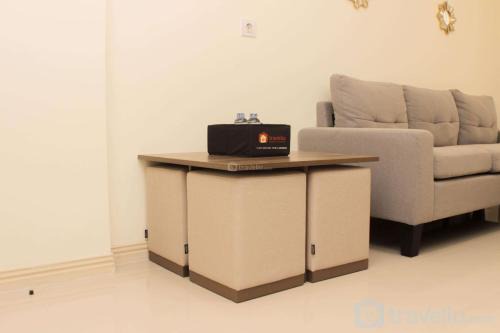 Warm and Cozy Living 3BR at Meikarta Apartment By Travelio