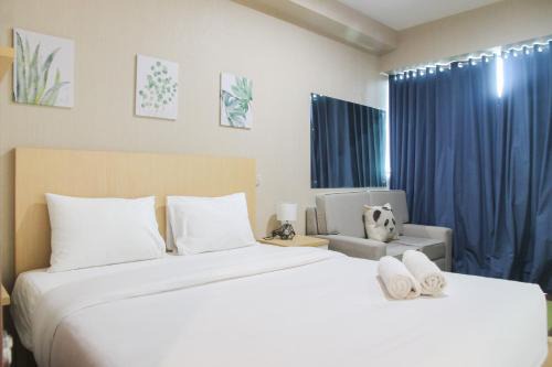 Cozy 1BR Apartment Grand Kamala Lagoon By Travelio in Bekasi