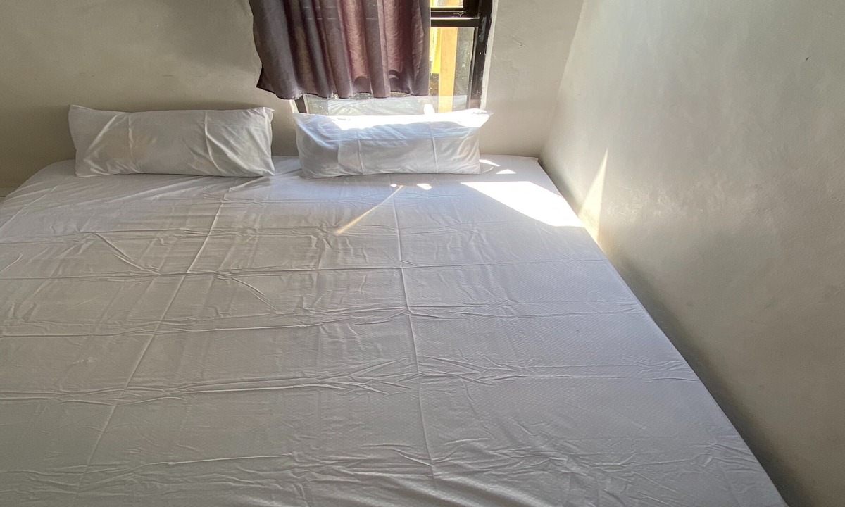 Tanjung Hotel | OYO Life Kos Bu Luh Mangku