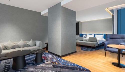 Family King Suite with Sofa Bed and Pool View