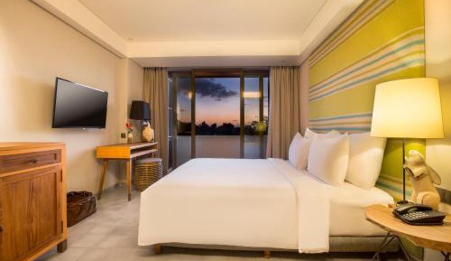 Deluxe Room with Balcony and Pool View - Complimentary Treats