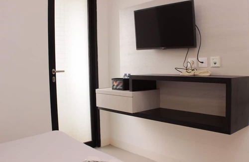 Karawang Apartment | Cozy Living Studio At Urbantown Apartment Karawang