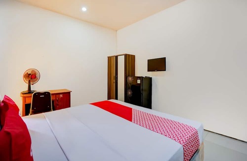 Suko Manunggal Hotel | OYO 90935 Rumah Kost Metroliving