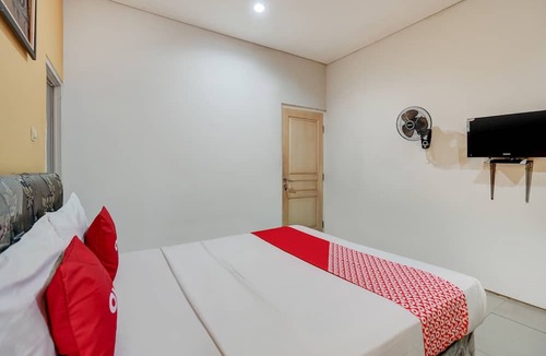 Suko Manunggal Hotel | OYO 90935 Rumah Kost Metroliving