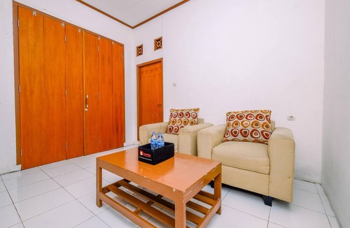 Caringin Apartment | Homey And Simply Studio At Graha Wishnu Guest House