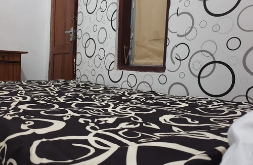Dinoyo Hotel | OYO Life 92622 Jatiluhur Kost Syariah