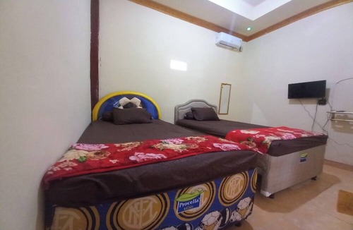 Bailangu Hotel | OYO 90731 E-kreasi Home