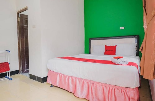 Gunung Sugih Hotel | RedDoorz Syariah near Kebun Raya Liwa