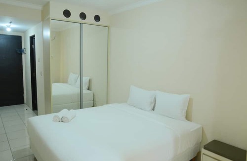Panunggangan Utara Apartment | Simply Studio Room at Grand Serpong Apartment By Travelio