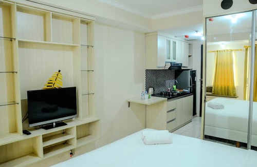 Panunggangan Utara Apartment | Simply Studio Room at Grand Serpong Apartment By Travelio