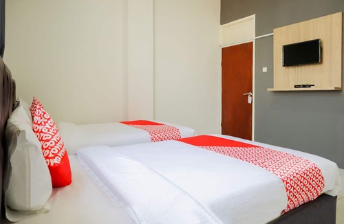 Gambir Hotel | Hotel O Pasar Baru Inn