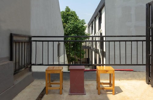 Tangerang House | OYO 737 Kamar Keluarga Mahkota 8