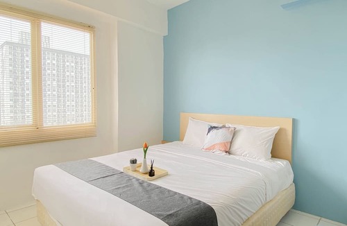 Pancawati Apartment | Cozy With Blue Accent 2Br At Podomoro Golf View Apartment