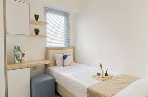 Pancawati Apartment | Cozy With Blue Accent 2Br At Podomoro Golf View Apartment