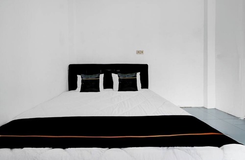 Beji Hotel | Hotel O near Jatim Park 3 formerly Srikandi Residence