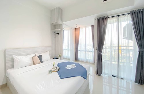 South Tambun Apartment | Simple White Designed Studio At Lrt City Bekasi Apartment