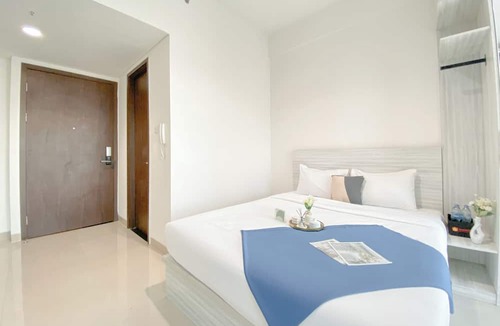 South Tambun Apartment | Simple White Designed Studio At Lrt City Bekasi Apartment