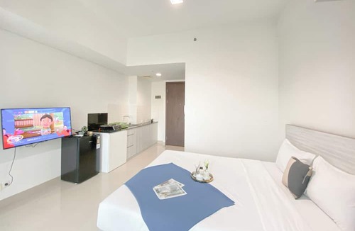 South Tambun Apartment | Simple White Designed Studio At Lrt City Bekasi Apartment