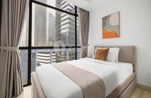 East Kuningan Apartment | Marmo by Kozystay - Kuningan