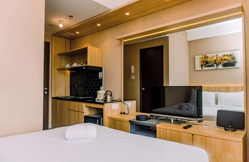 Ciputat Apartment | Comfort And High Floor Studio Room At Transpark Bintaro Apartment