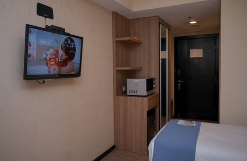 Panunggangan Utara Apartment | Warm and Minimalist Studio (No Kitchen) at Great Western Apartment