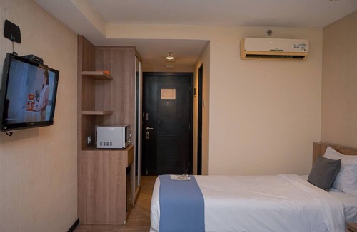 Panunggangan Utara Apartment | Warm and Minimalist Studio (No Kitchen) at Great Western Apartment