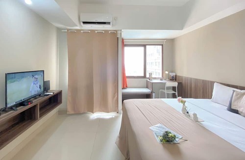 Duren Sawit Apartment | Cozy and Warm Studio at LRT City Jatibening Apartment