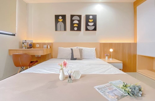 Depok Apartment | Cozy Living Studio at Evenciio Margonda Apartment