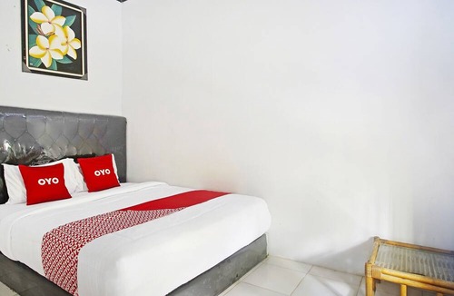 Kalianda Hotel | OYO 90229 Fidel Caestro Homestay