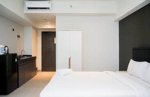 Pagedangan Apartment | Studio Apartment With Sofa At Carstensz Residence