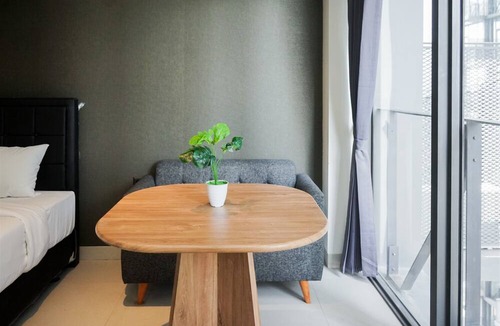 Pagedangan Apartment | Studio Apartment With Sofa At Carstensz Residence