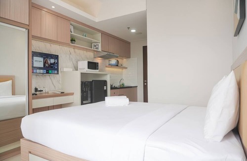 Ciputat Apartment | Warm And Minimalist Studio Transpark Bintaro Apartment
