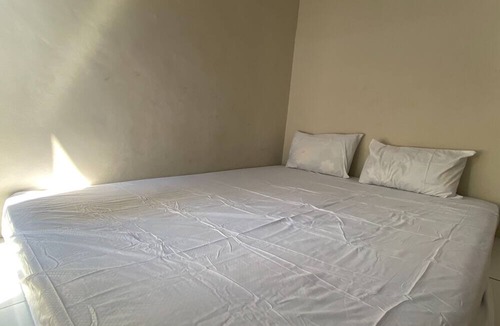 Tanjung Hotel | OYO Life Kos Bu Luh Mangku