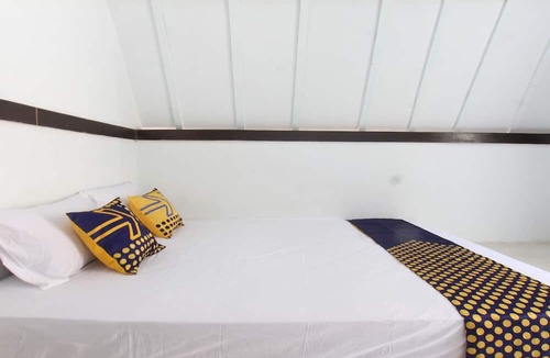 Tanjung Hotel | OYO Life 93125 Kos Bale Lumbung Syariah