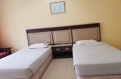 Parapat Hotel | Capital O 93393 Hermina Hotel