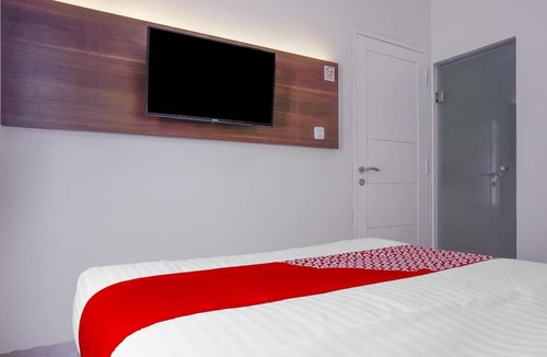 Taman Sari Hotel | Hotel O Pioneer Pasar Baru