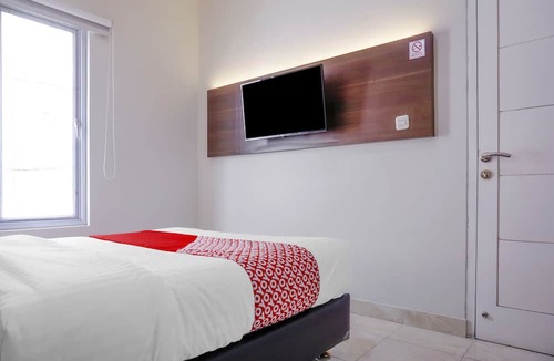Taman Sari Hotel | Hotel O Pioneer Pasar Baru