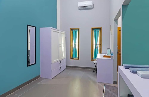 Jambi Hotel | OYO Life 92691 Mc Kost Syariah